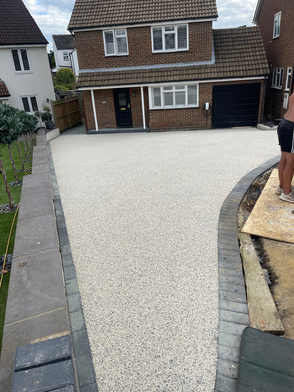 a driveway is being built in front of a house